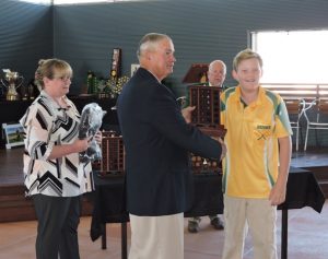 Joshua presented with his championship medal by Gordon Duncan, President of National Rifle Association of Australia.