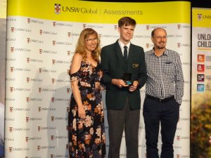 James Wright representing Westside Christian College, receives his national medal.