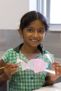 A Proud WCC Student and her Finished Fish