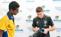 Westside Football Development Program students with Scott Neville of the Brisbane Roar.